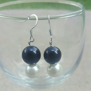 Black and faux pearl earrings